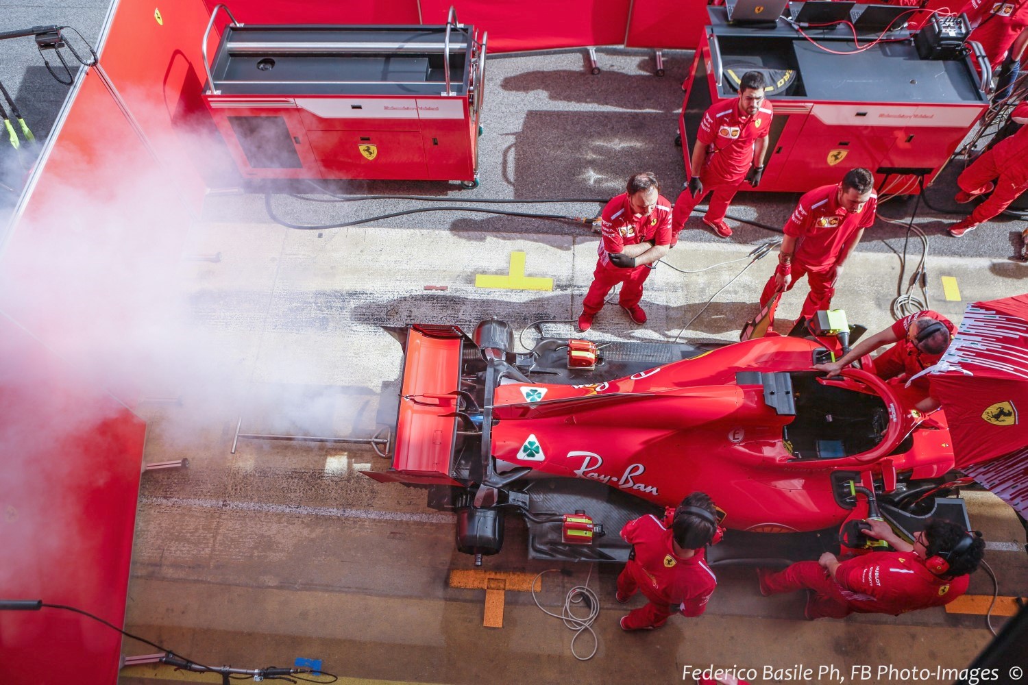 Is that oil burning out the back of the Ferrari?