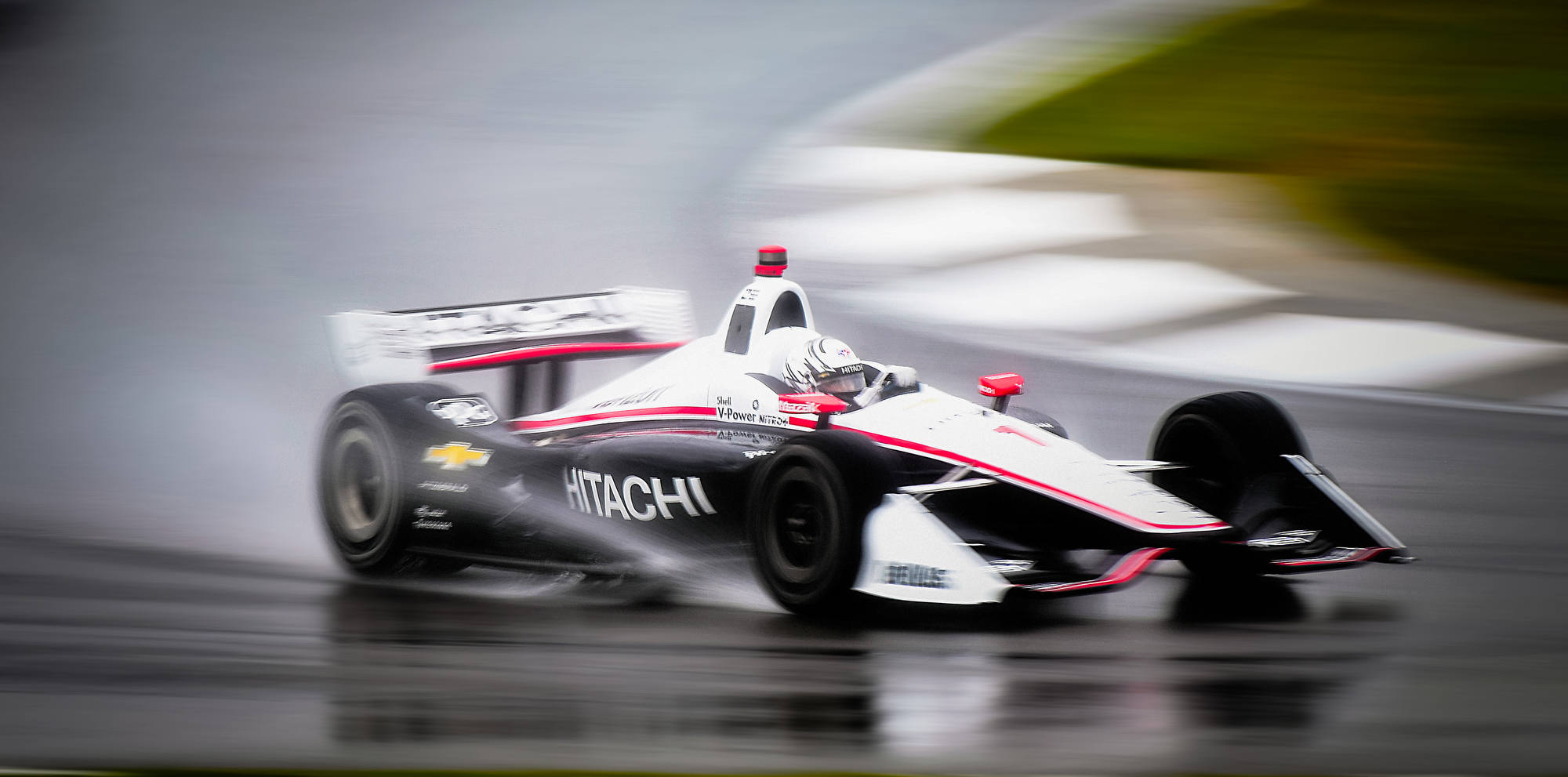 Newgarden winning in the rain last year at Barber