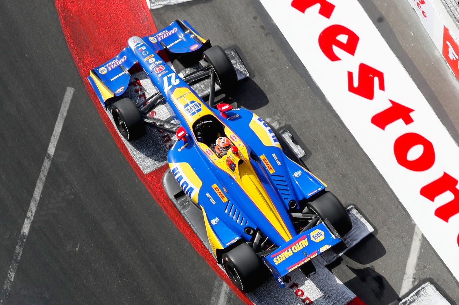 Alexander Rossi fastest in hot greasy conditions