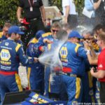 Rossi sprays his crew