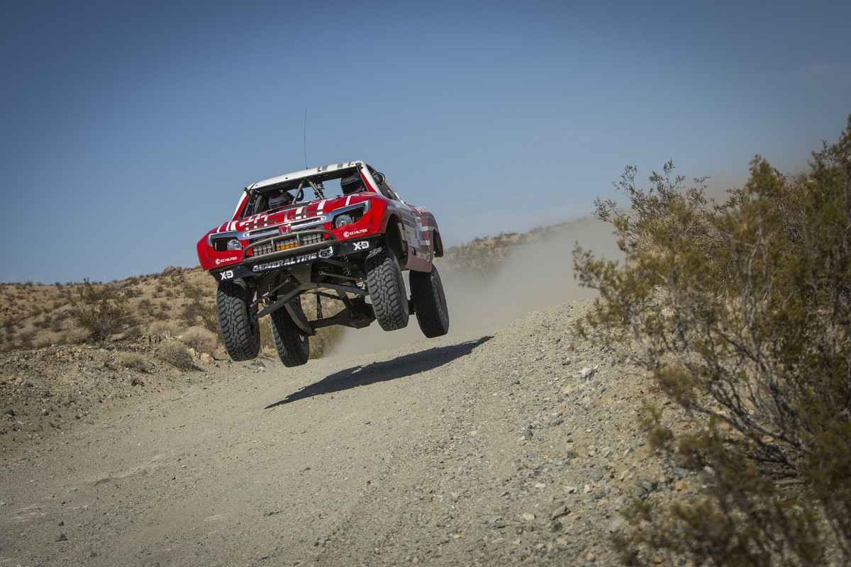 Rossi getting some air as he tests out his truck ahead of the Baja 1000