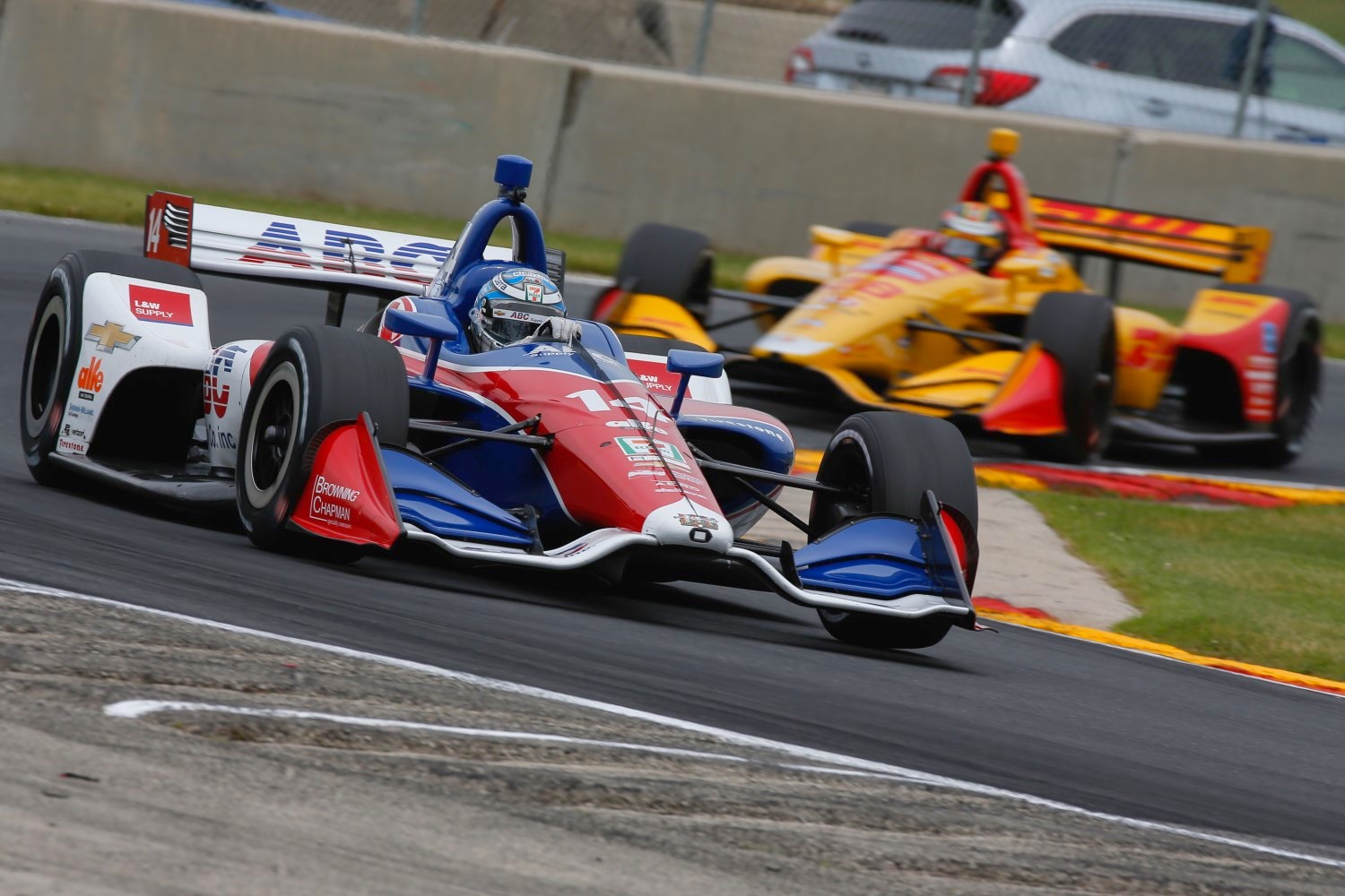 Kanaan leads Hunter-Reay.  The Andretti team is out to lunch so far