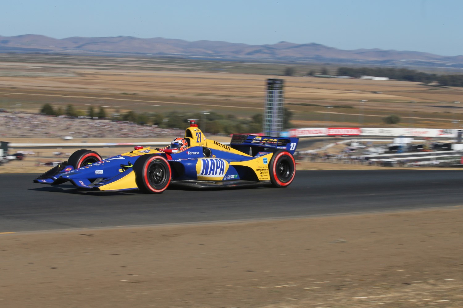 Alexander Rossi races before scarce crowd