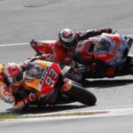 Marquez dives past Lorenzo