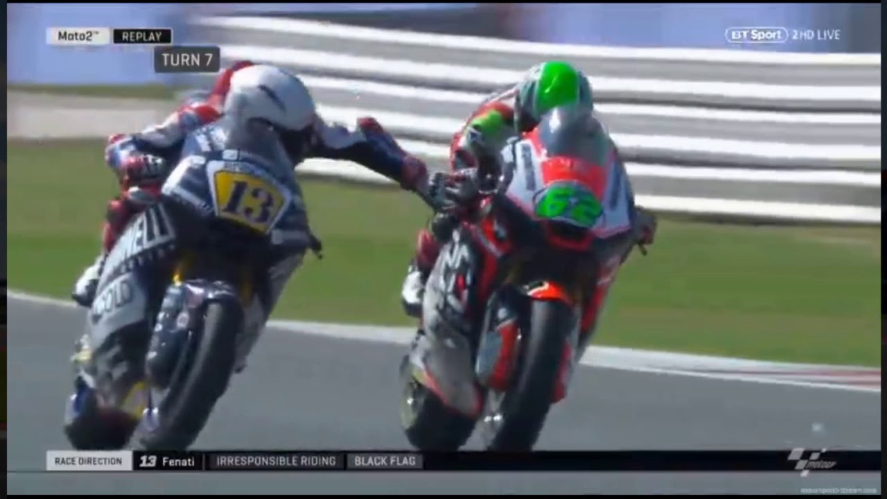 Fenati grabs brake of Manzi. Guy should be banned for life.