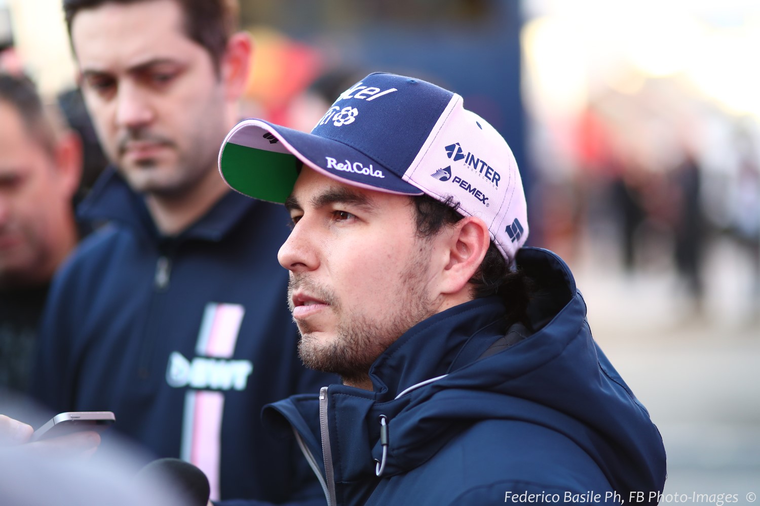 Sergio Perez talking to reporters in Barcelona