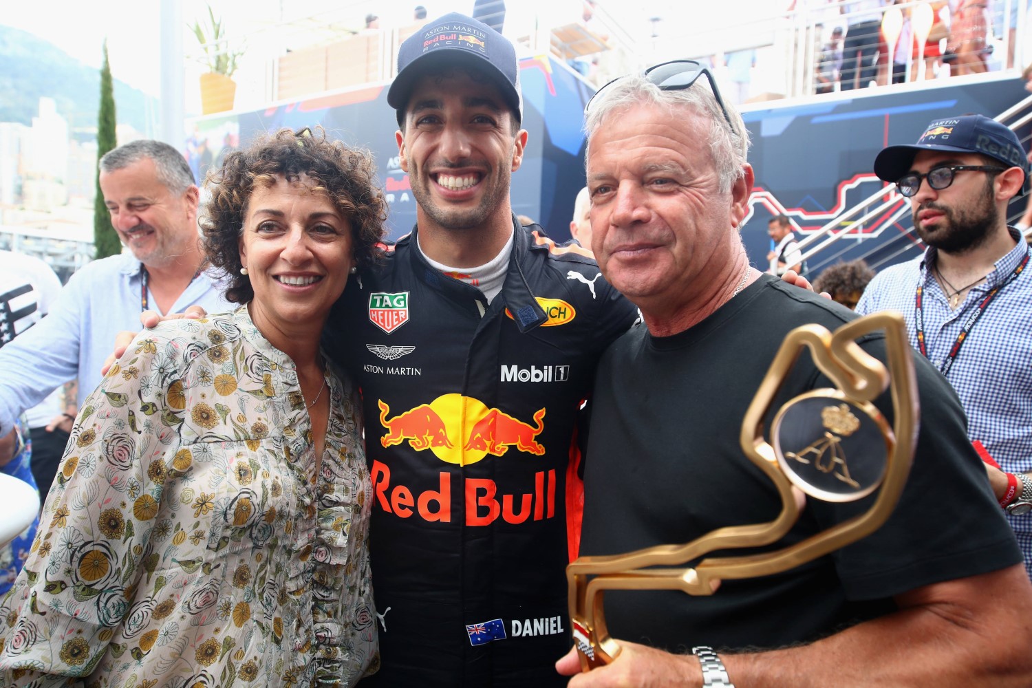 Daniel Ricciardo with his Italian parents Grace and Joe, will earn triple what Red Bull would pay him