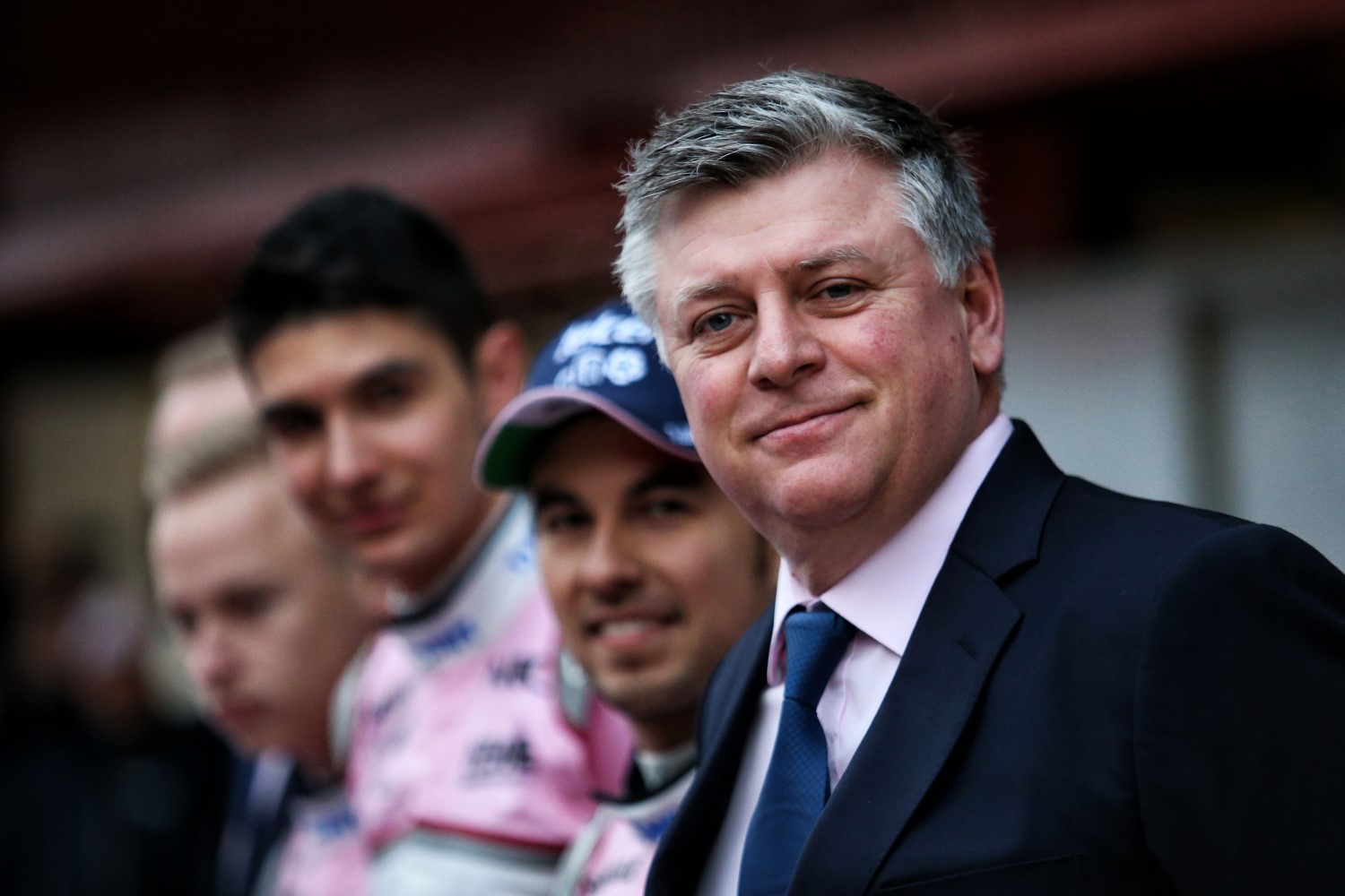 Otmar Szafnauer (R) smiles when he hears Kubica's check has a lot of zeros