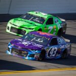 2nd place Bubba Wallace Jr. battles with Danica Patrick early