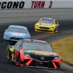 Truex charges to victory