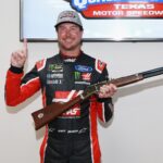 Kurt Busch won a gun for winning the pole