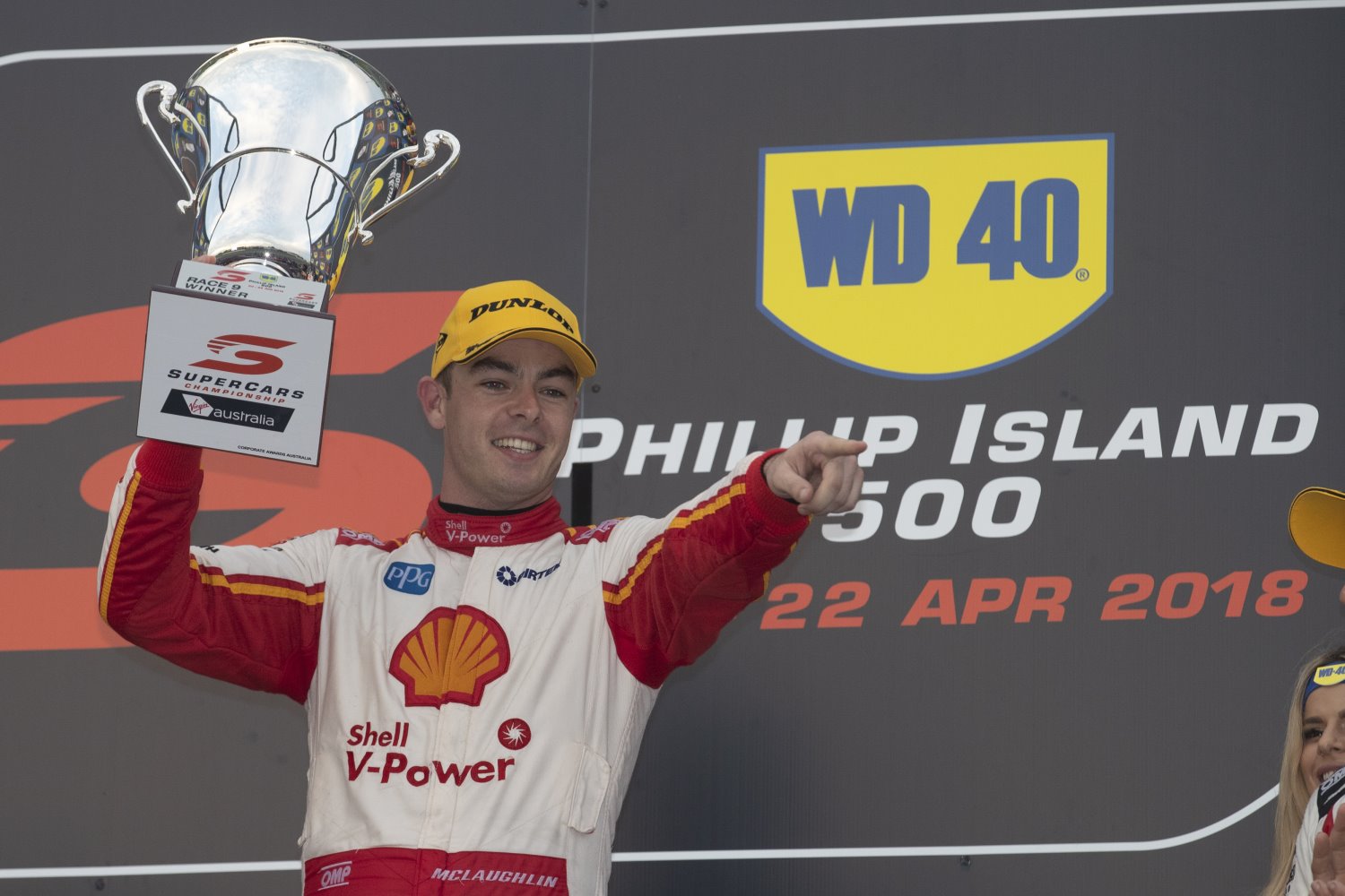 Scott McLaughlin celebrates on podium