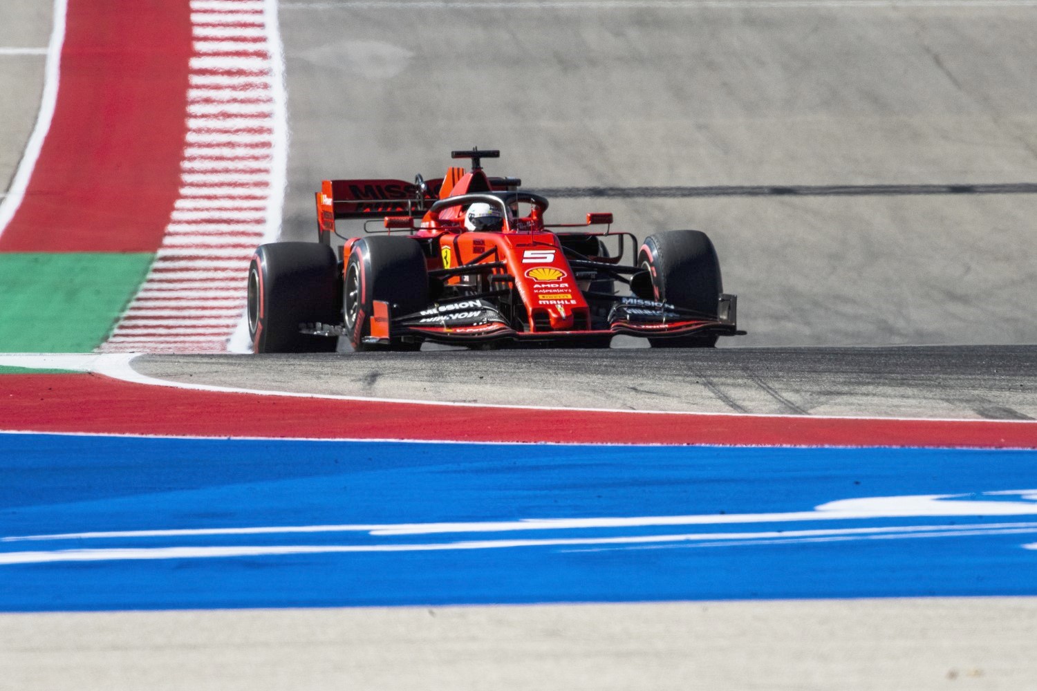 Did the washboard Austin circuit unsettle the inferior Ferrari chassis, thereby requiring them to run more downforce?