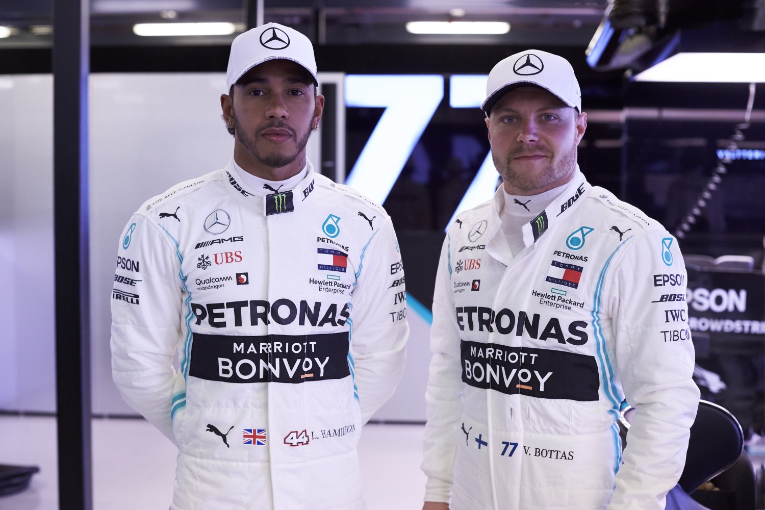Hamilton and Bottas relax in the garage as the other drivers try in vain to beat their times