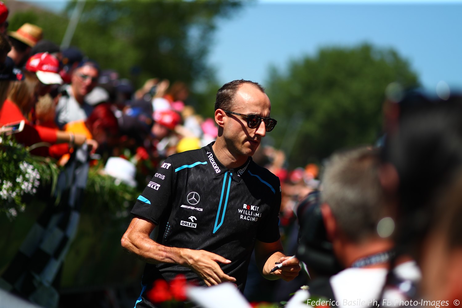 Kubica signing autographs in Austria. He was so slow he was lapped 3 times