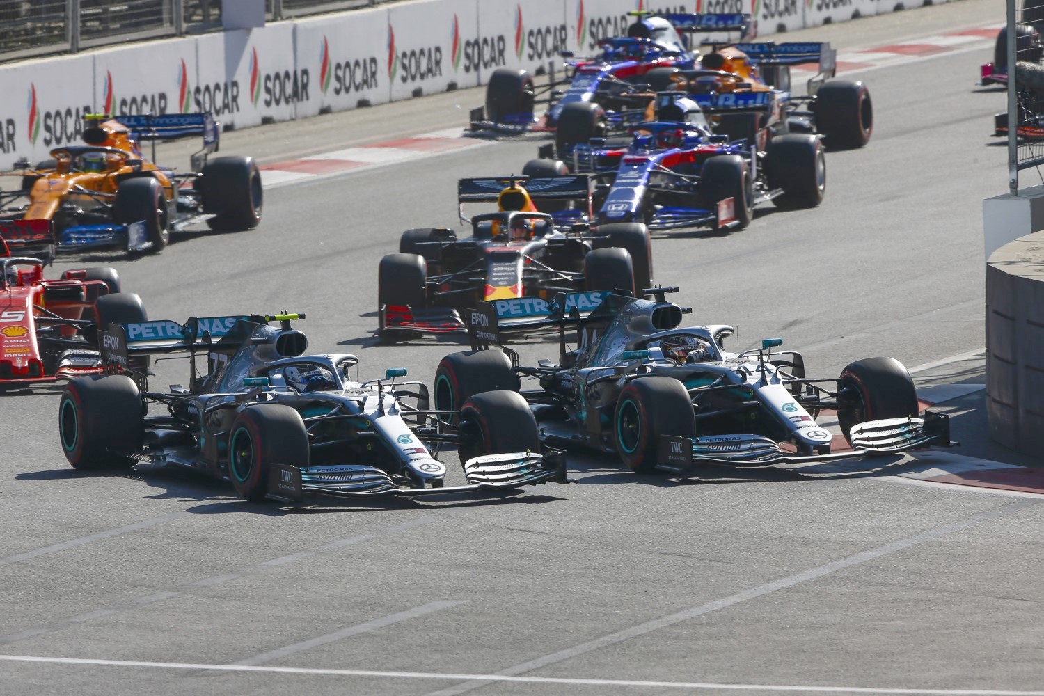 Hamilton and Bottas battled side-by-side in Turn 1. They dominated the race and left Ferrari sucking their fumes once again