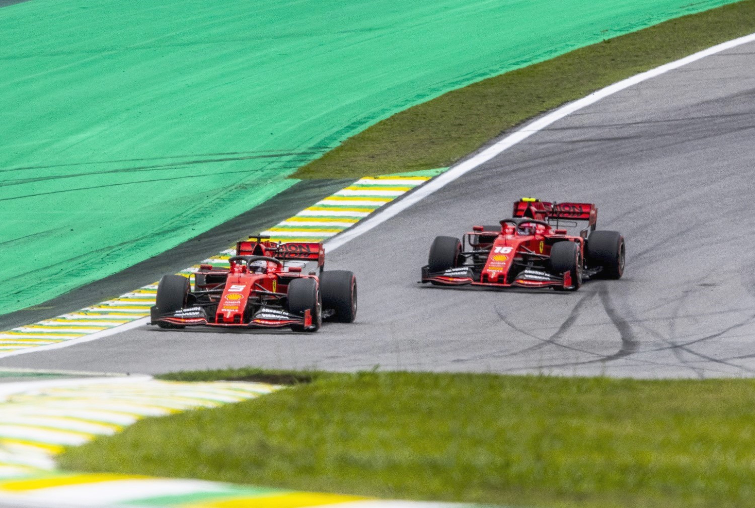 Ferraris circulate together before crashing