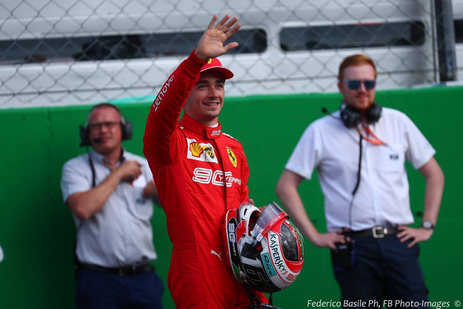 Charles Leclerc waves to crowd