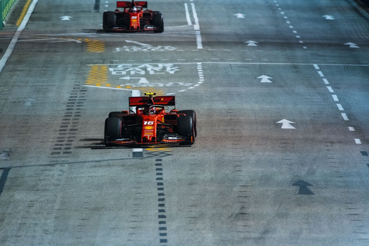 The Ferraris of Leclerc and Vettel