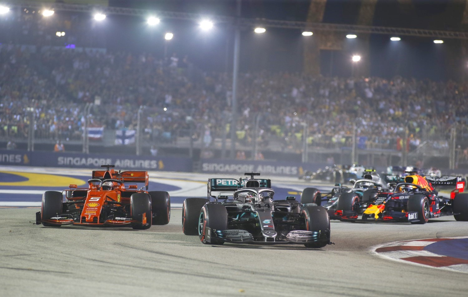 Vettel battles Hamilton at the start
