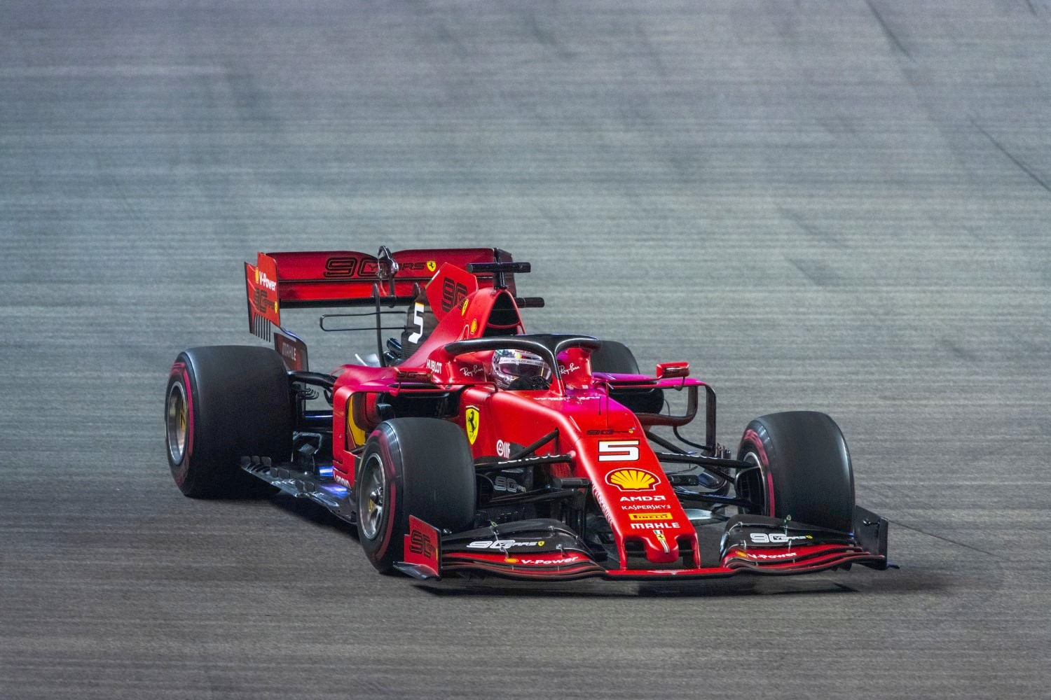 Vettel comfortably held off his Ferrari teammate to win in Singapore
