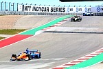 ScottDixon9,leadsagroupofcarsintoturn2.jpg