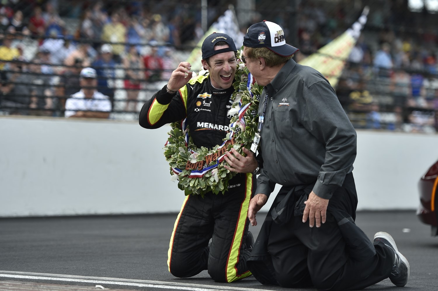 Pagenaud with John Menard on yard of bricks