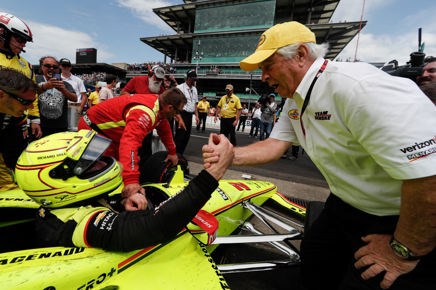 Team boss Roger Penske congratulates Simon Pagenaud