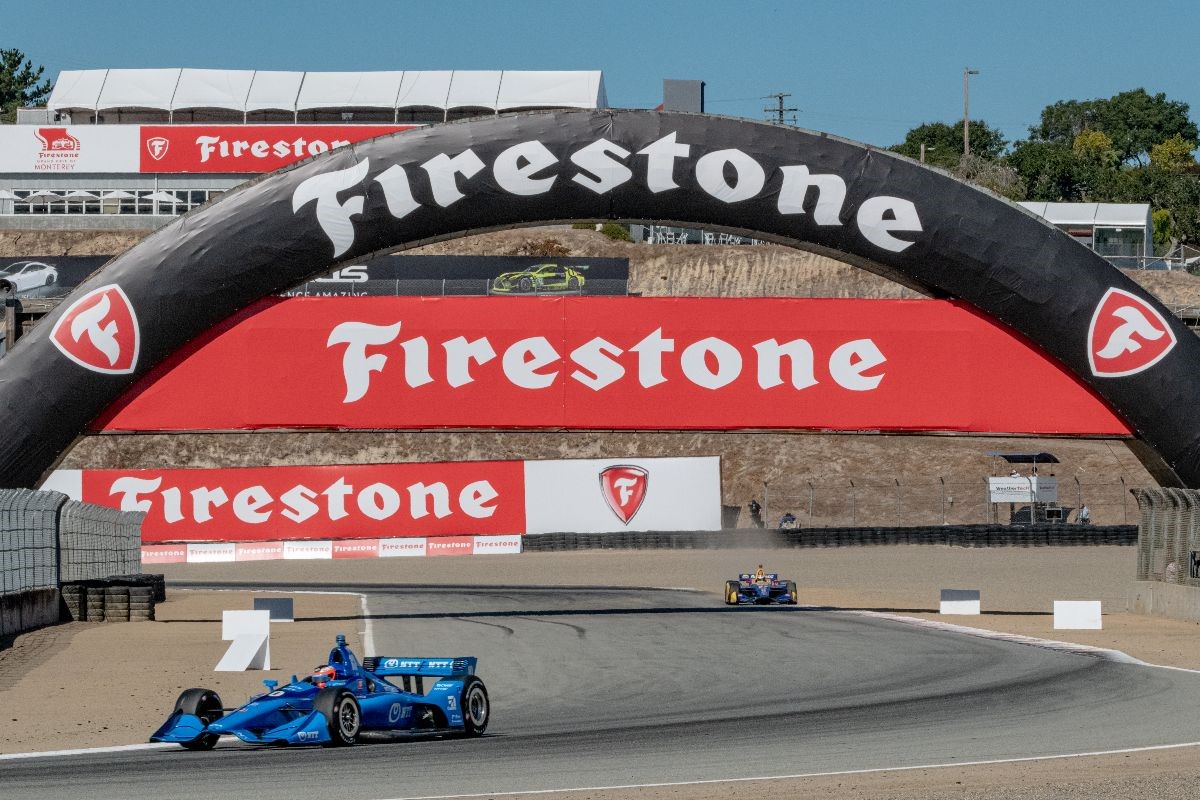 Rosenqvist gaps Rossi under the Firestone Bridge