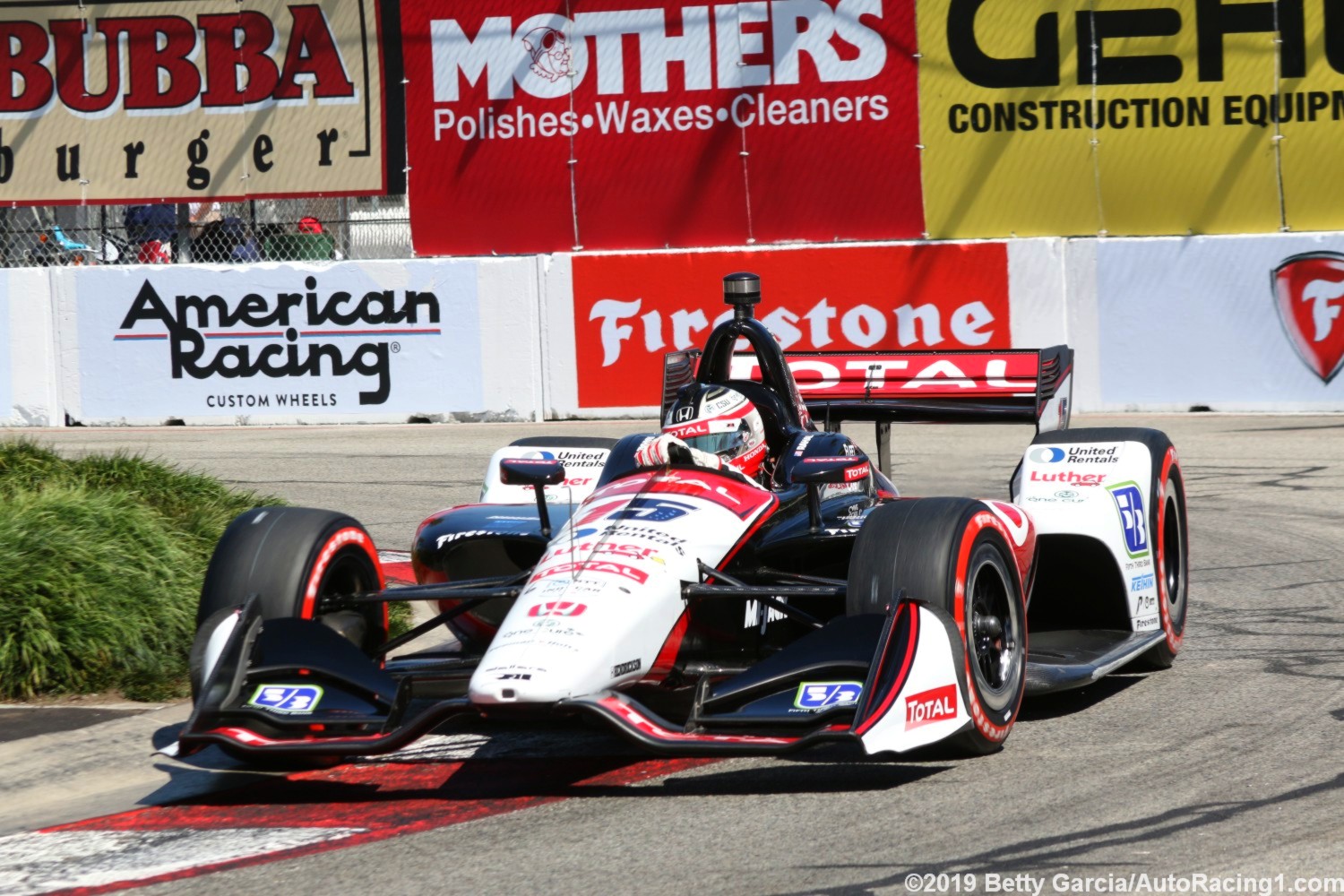 Graham Rahal lost 3rd on the final lap and had to settle for 4th after a penalty for blocking