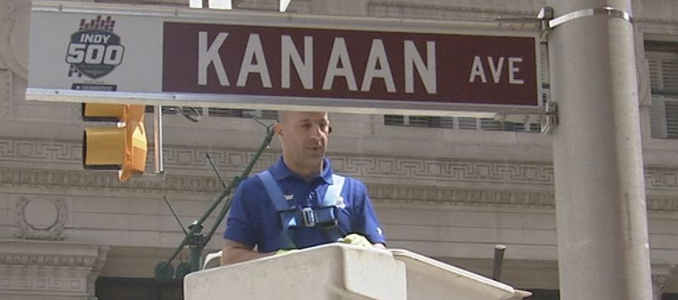 Indy 500 winner Tony Kanaan unveils "Kanaan Avenue" sign. (WTHR Staff)