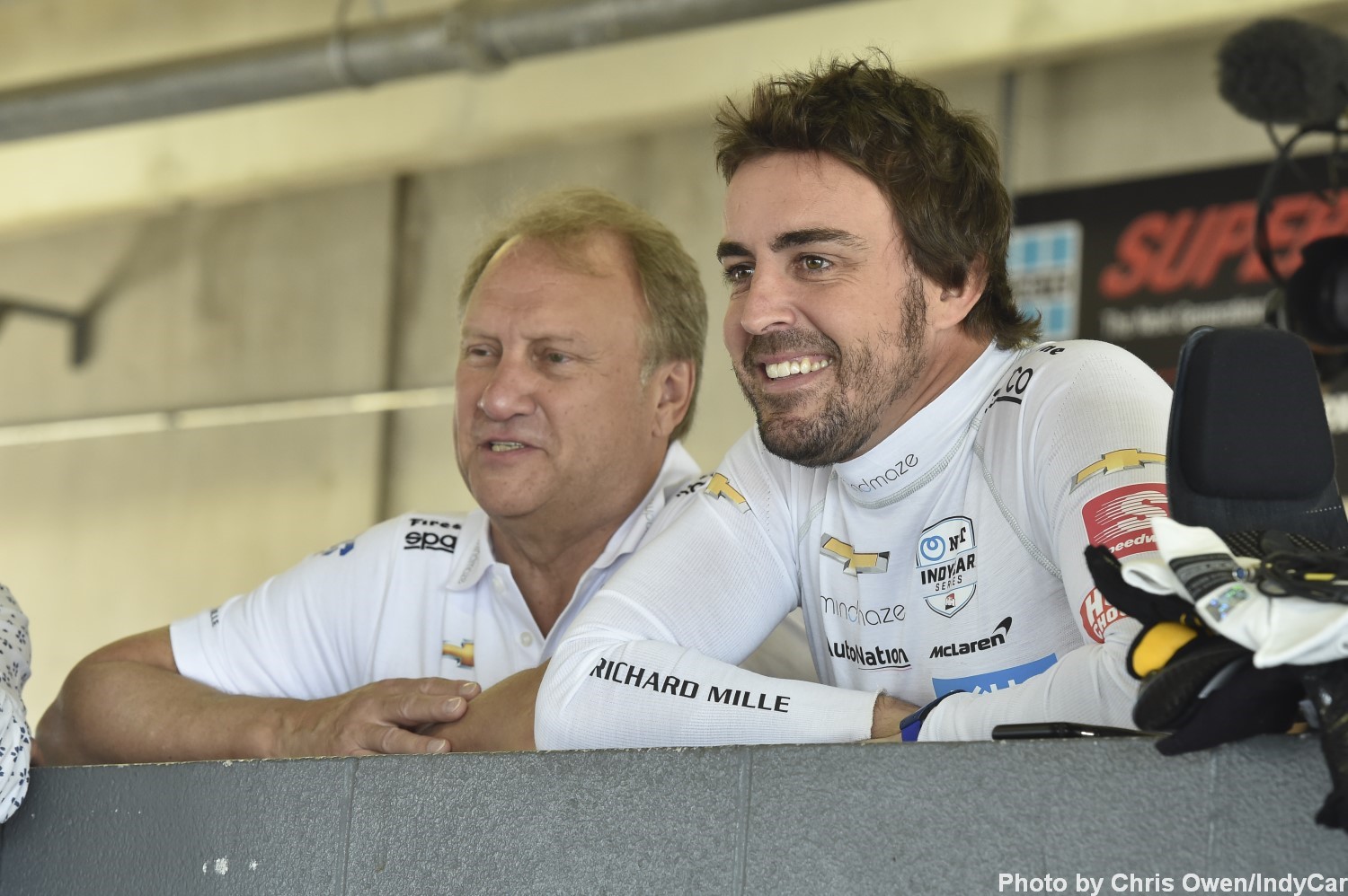 Team boss Bob Fernley and Alonso in the garage