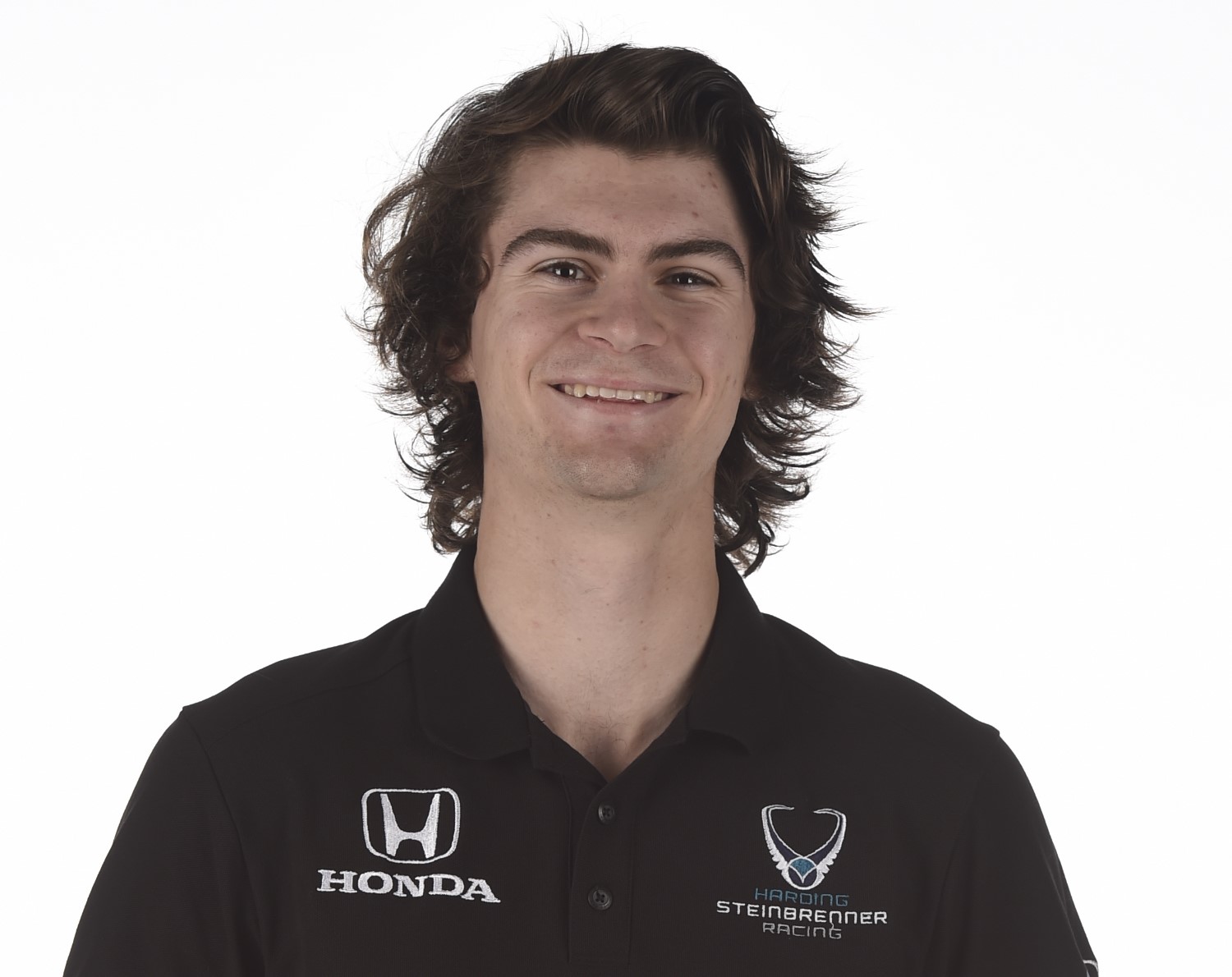Why is this man smiling? He just landed a top IndyCar ride