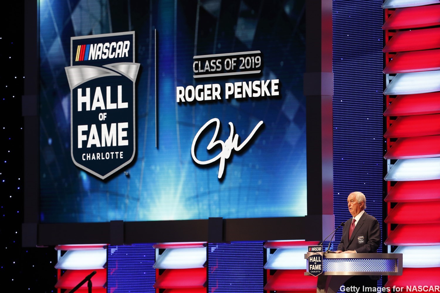 Roger Penske speaks as he is inducted into the NASCAR Hall of Fame
