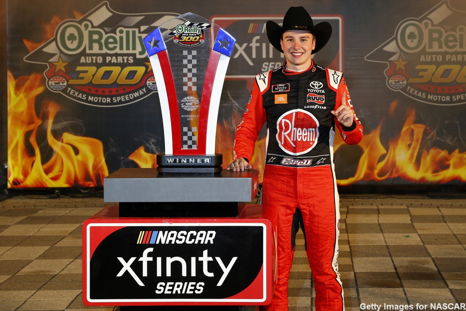 Christopher Bell poses with the trophy in Victory Lane after winning Saturday night's NASCAR Xfinity Series race at Texas Motor Speedway