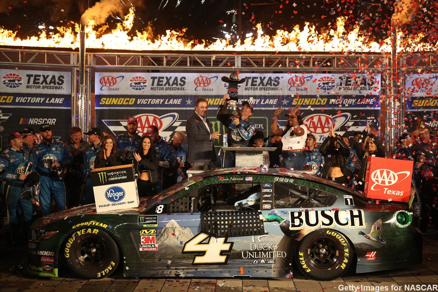 Kevin Harvick, driver of the #4 Busch Beer/Ducks Unlimited Ford, celebrates in Victory Lane after winning the Monster Energy NASCAR Cup Series AAA Texas 500 