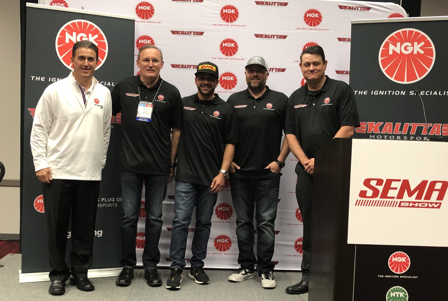 Brian Norko, Doug Kalitta, J.R. Todd, Shawn Langdon and Chad Head at NGK Kalitta Motorsports sponsorship announcement during SEMA