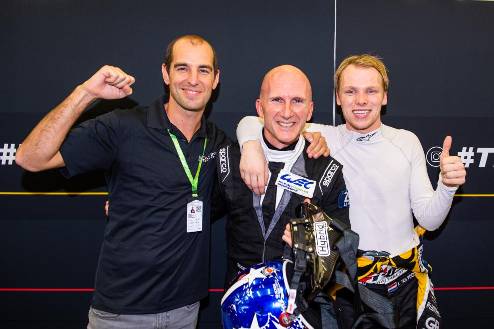 #57 Porsche drivers celebrate their win