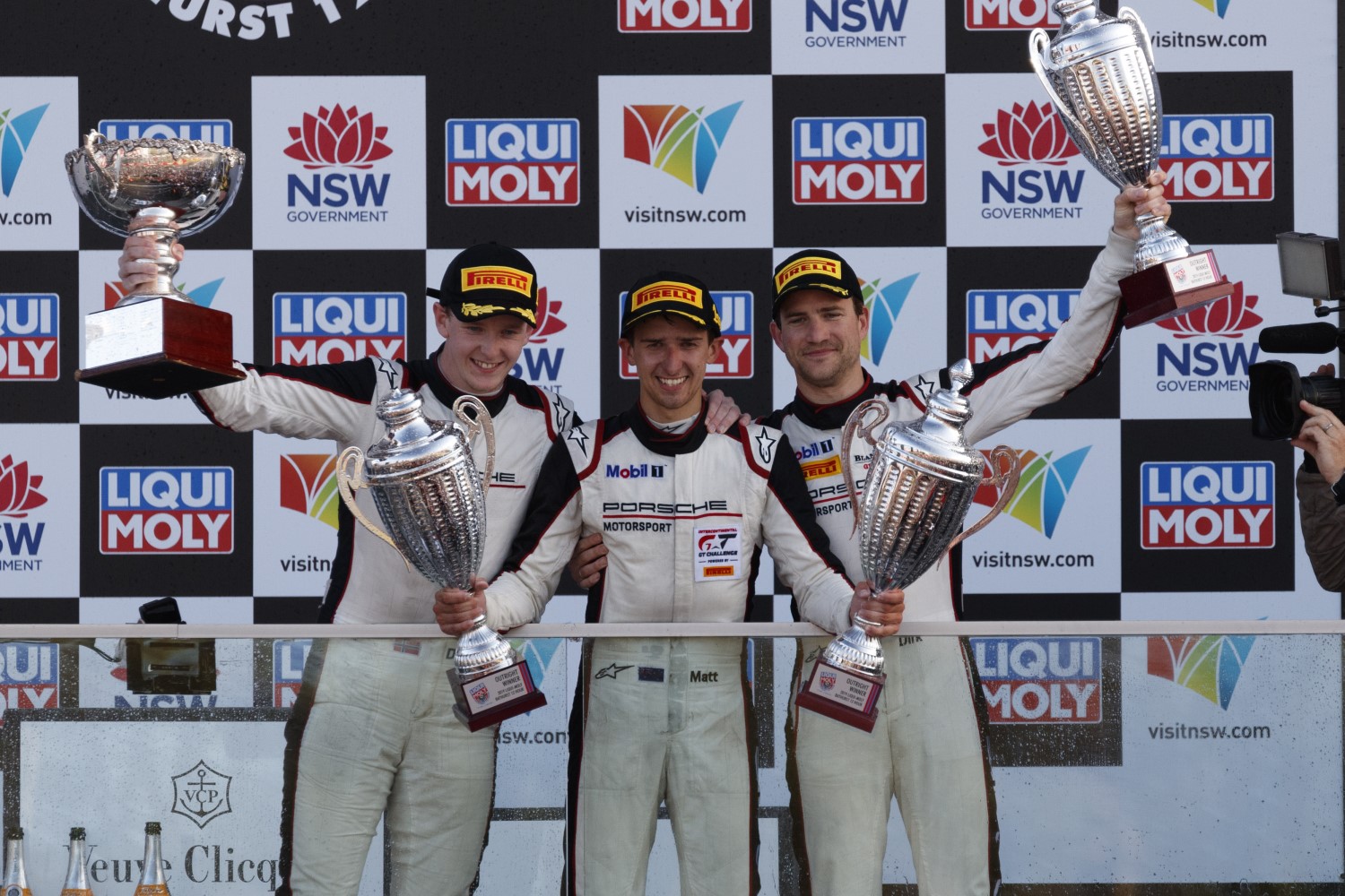 Olson, Campbell and Werner celebrate their win