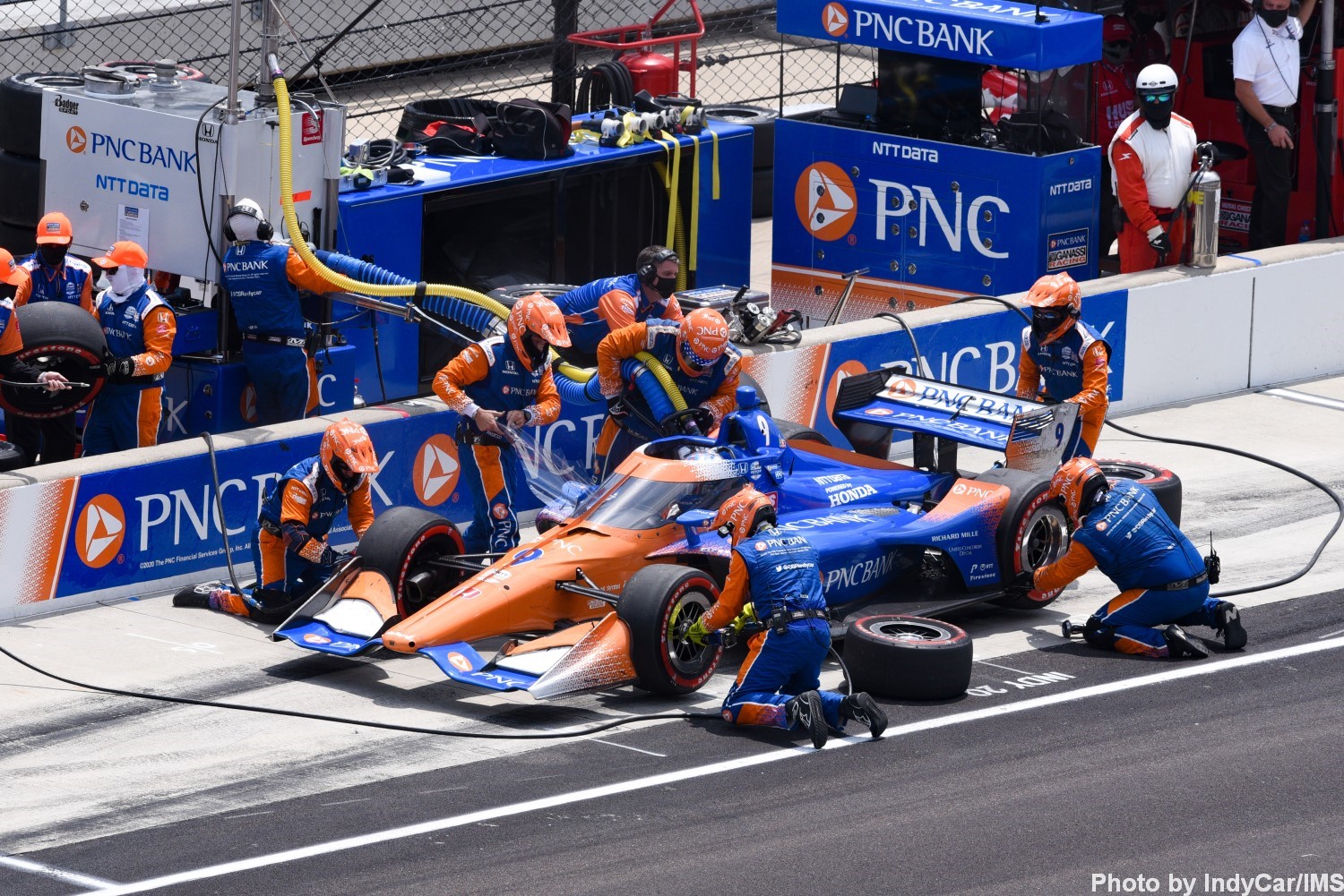 Scott Dixon was mired toward the back until luck fell his way