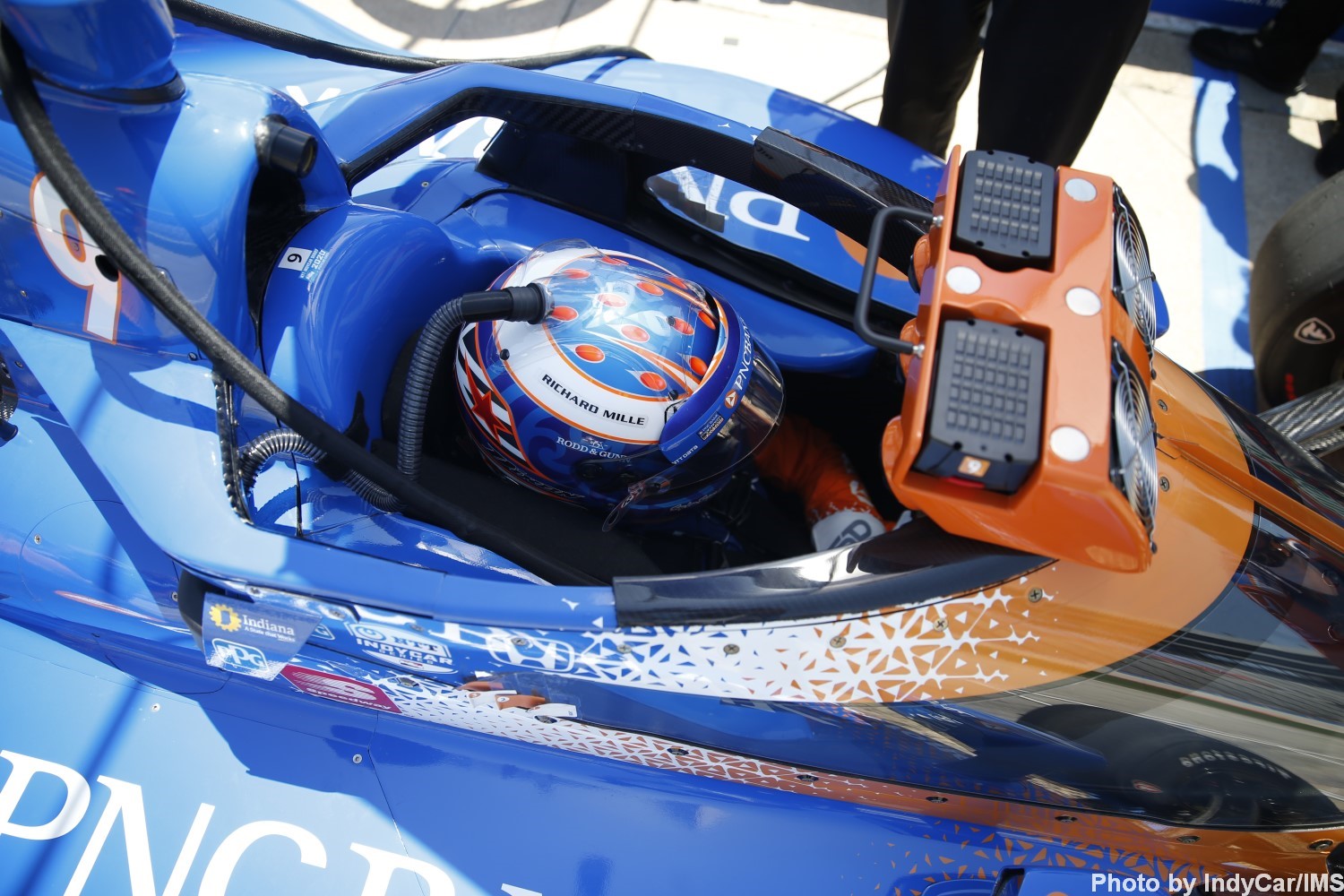 Air is funneled into the driver's helmet for cooling