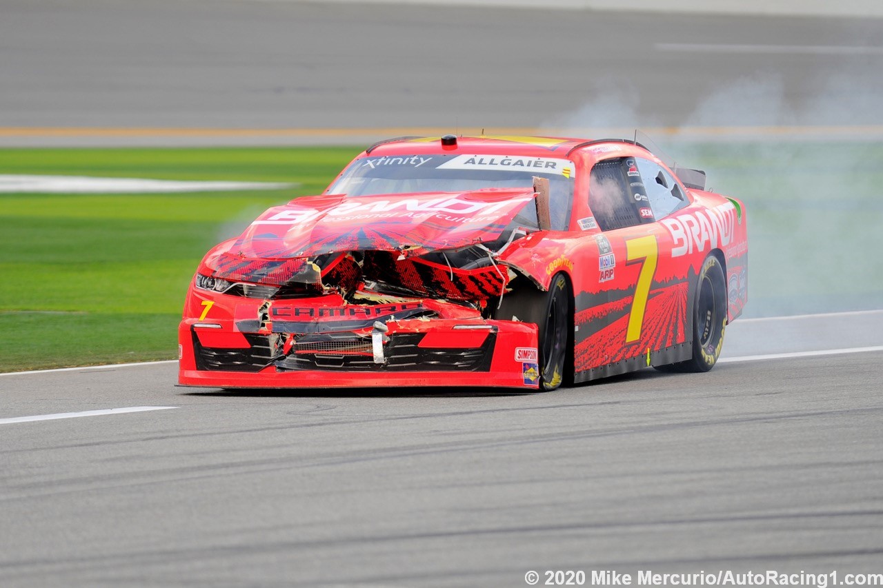 Allgaier brings his wadded up Camaro onto pit road