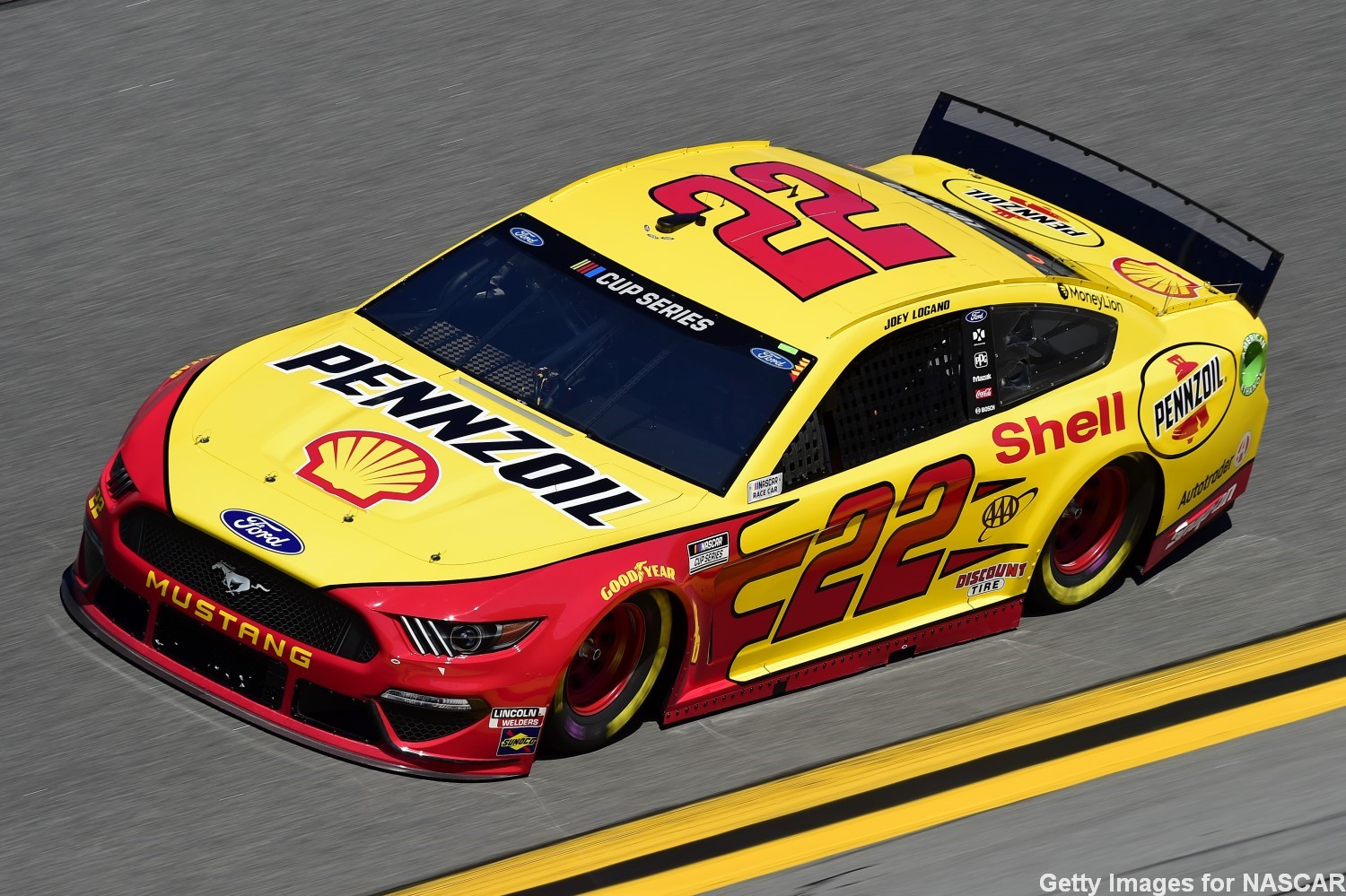 Joey Logano raced to the victory in the first Bluegreen Vacations Duel qualifying race on Thursday night