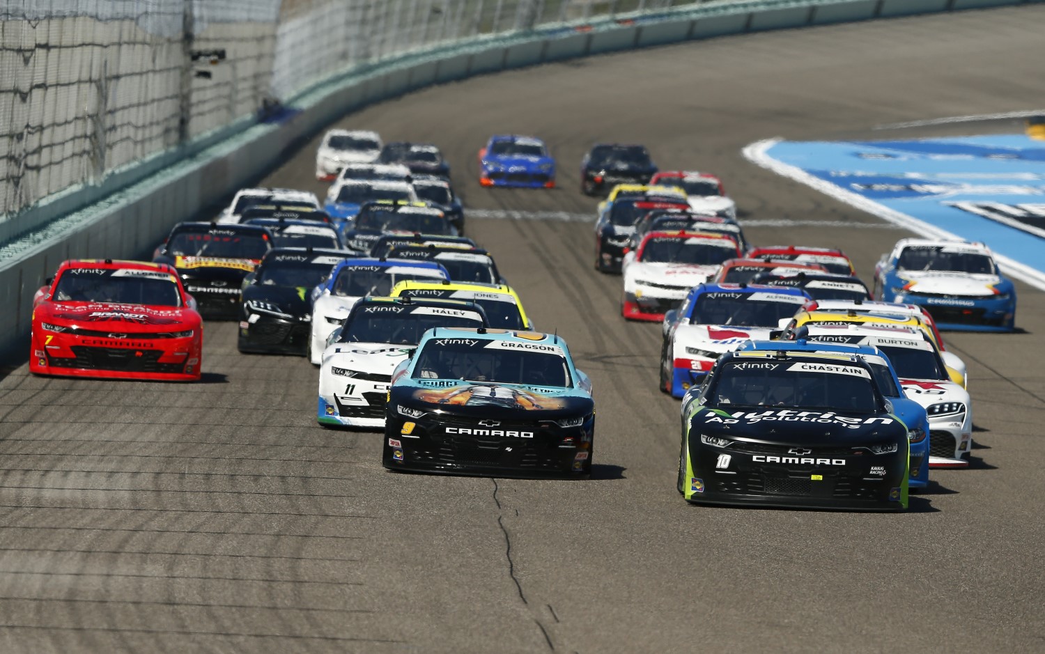 Ross Chastain, driver of the #10 Nutrien Ag Solutions Chevrolet, and Noah Gragson, driver of the #9 PUBG MOBILE Chevrolet, lead the field