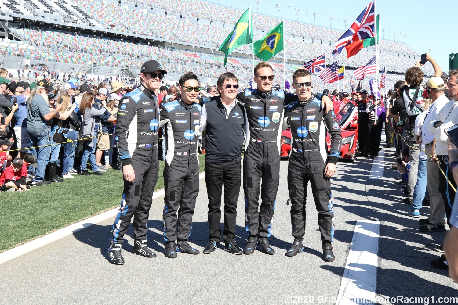 The #10 Cadillac drivers head for victory