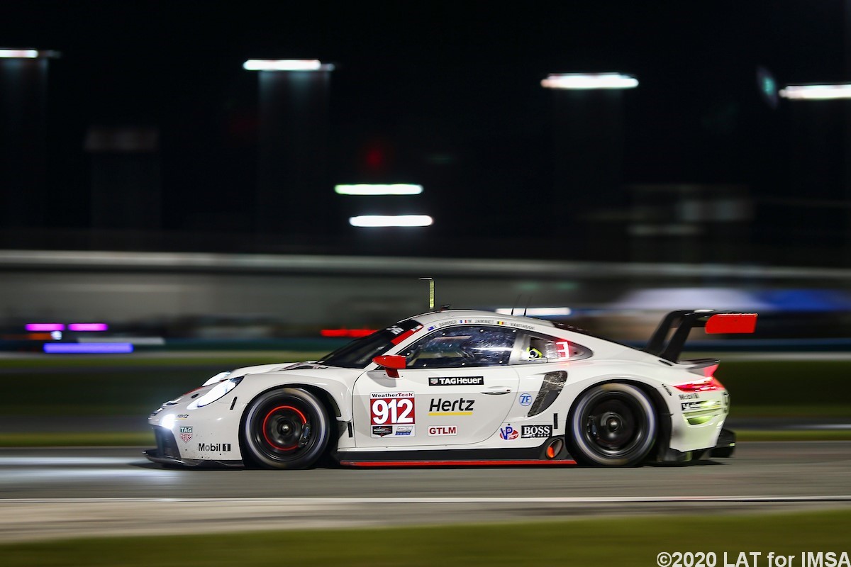 The #912 Porsche came out of the night in the lead