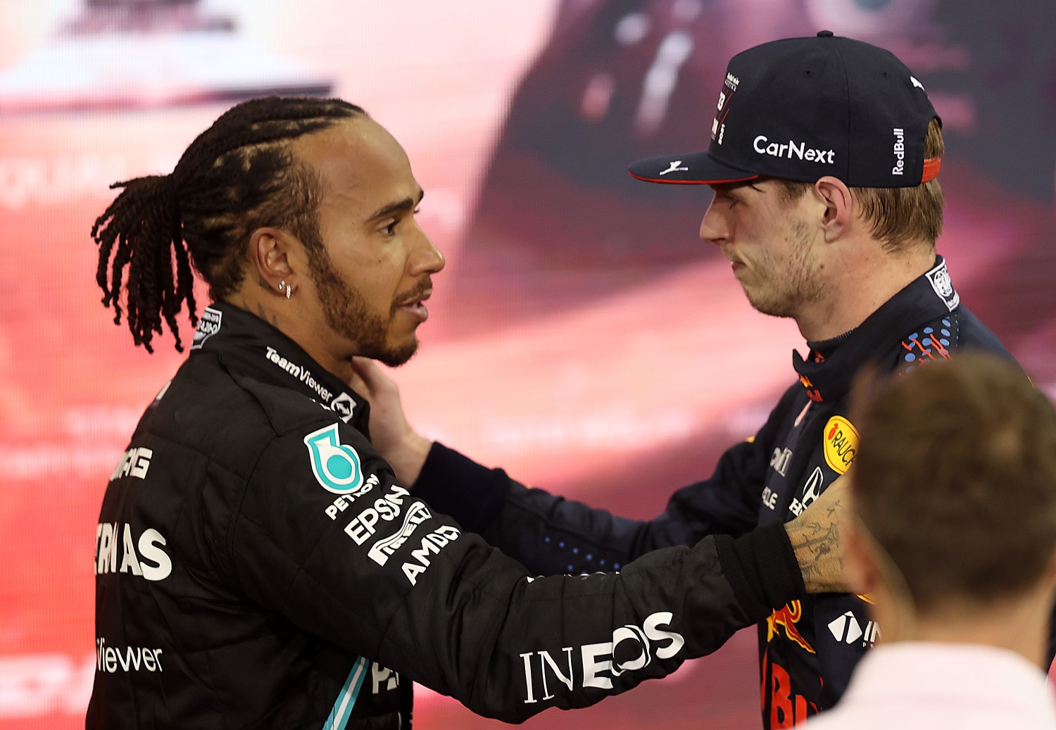 Lewis Hamilton and Max Verstappen congratulate each other on the podium