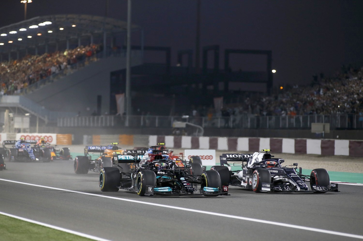2021 Qatar GP Hamilton drags Gasly down to turn 1 - Jiri Krenek Photo