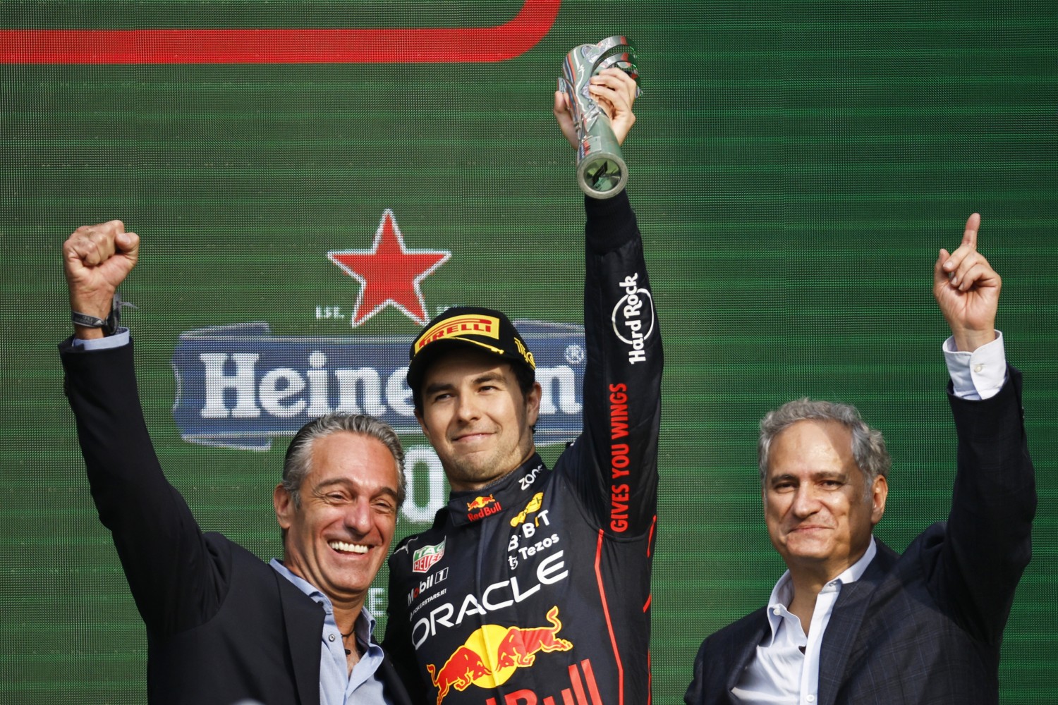Third placed Sergio Perez of Mexico and Oracle Red Bull Racing celebrates on the podium during the F1 Grand Prix of Mexico at Autodromo Hermanos Rodriguez on October 30, 2022 in Mexico City, Mexico. (Photo by Jared C. Tilton/Getty Images)