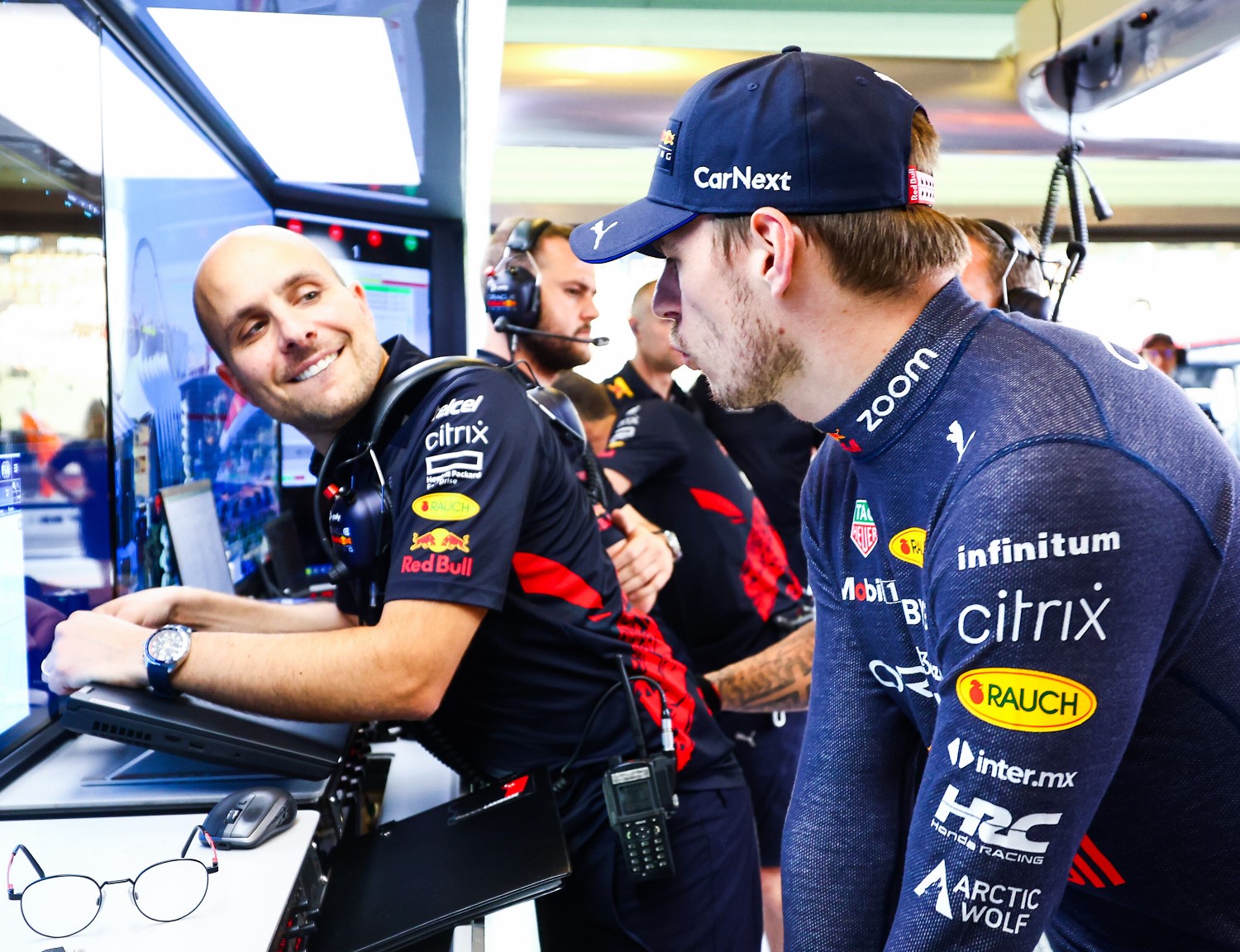 Max Verstappen of the Netherlands and Oracle Red Bull Racing talks with race engineer Gianpiero Lambiase in the garage during practice ahead of the F1 Grand Prix of Abu Dhabi at Yas Marina Circuit on November 18, 2022 in Abu Dhabi, United Arab Emirates. // Getty Images / Red Bull Content Pool